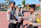 Kapolres-Kupang-Pimpin-Upacara-PTDH-Dua-Personilnya,-Ajak-Anggota-Jiwai-Makna-Tribrata-dan-Catur-Prasetya